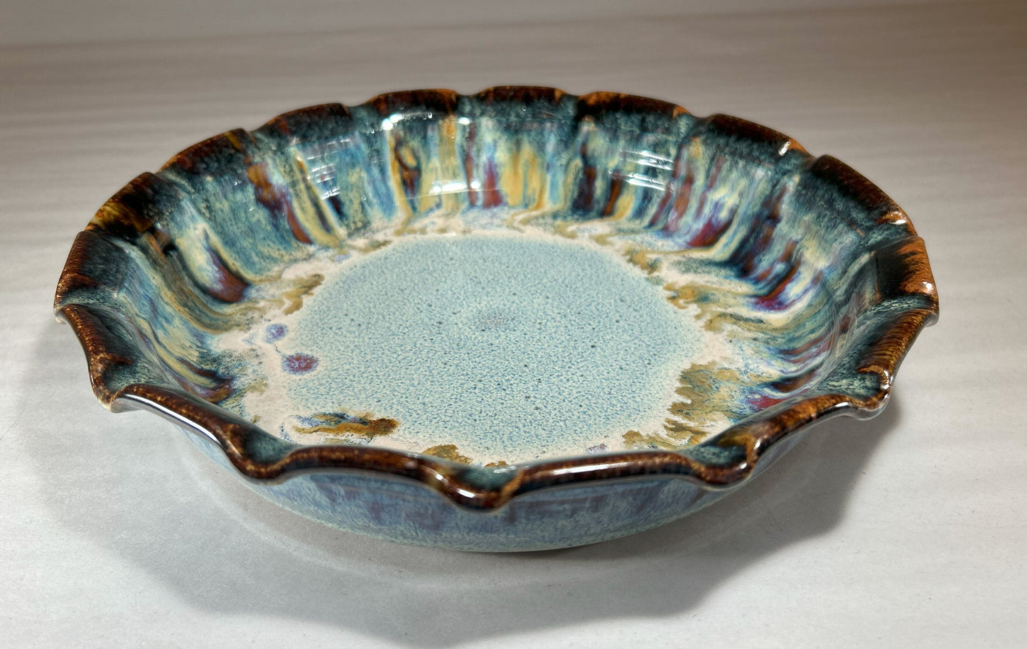 Stoneware Pie Plate Deep dish with fluted edge.