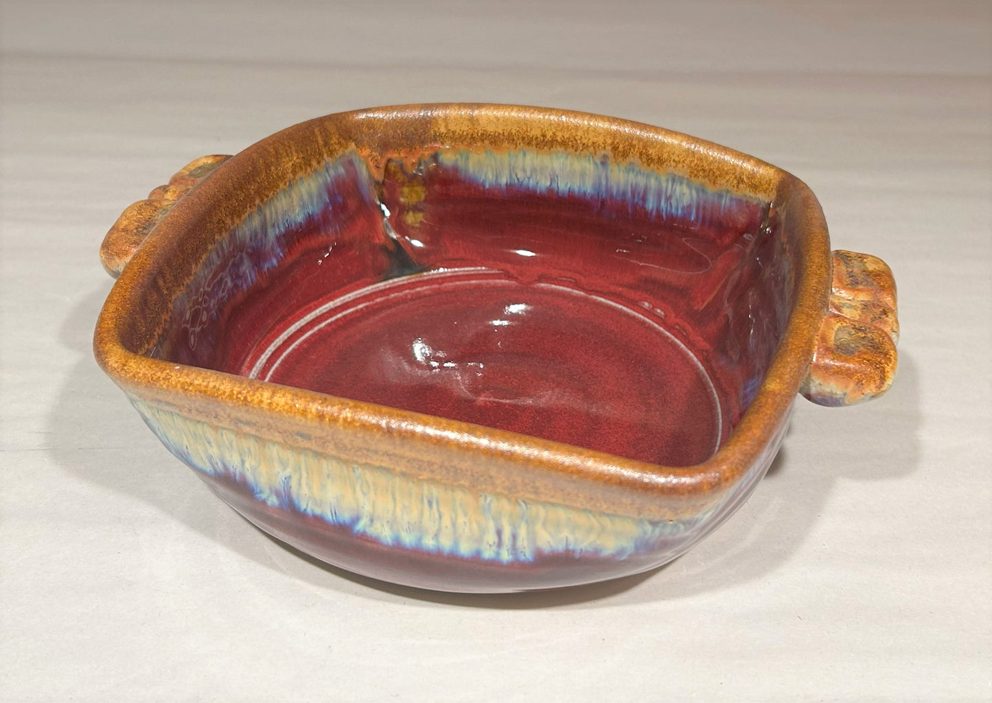 Square pottery baking dish.