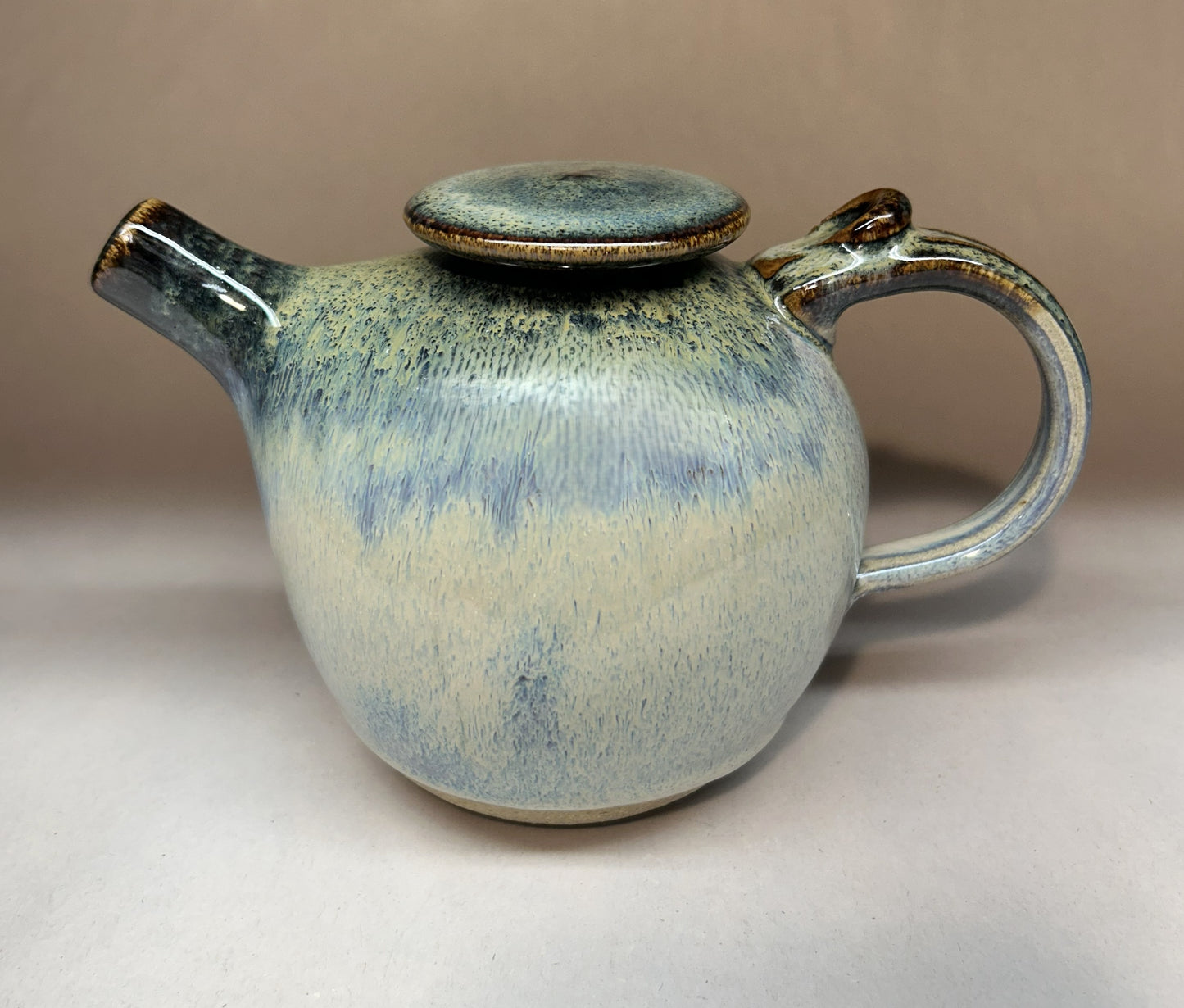 Small Handmade pottery teapot finished in a beautiful Rutile Blue &Temoku Glaze
