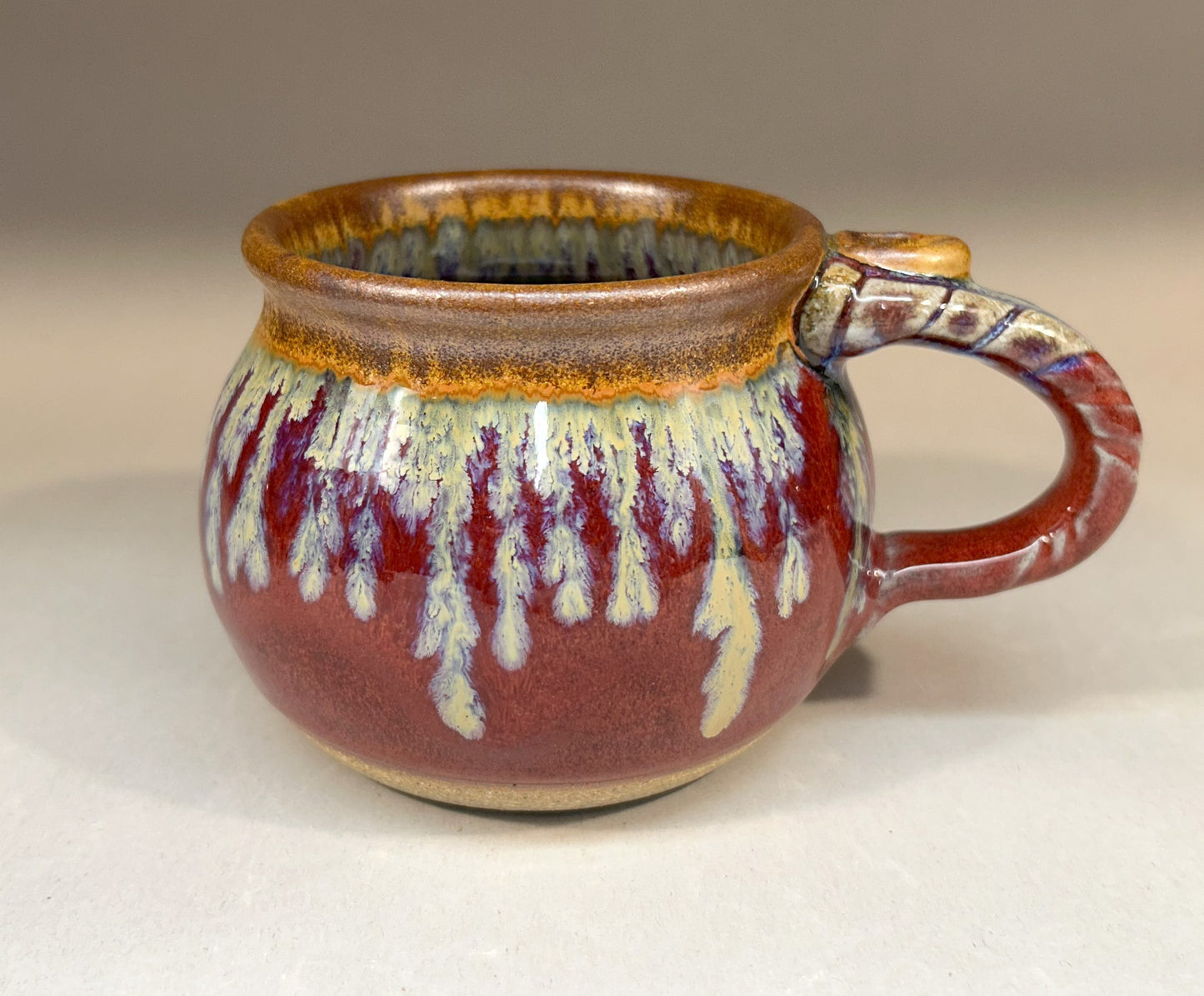 Round Handmade Pottery Mug with Copper Red & Iron Glaze