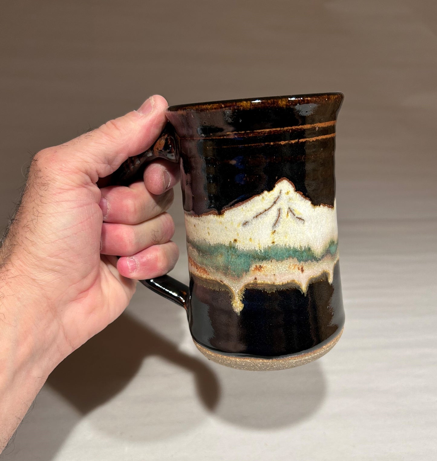 Pottery mug with Midnight Mountain glaze