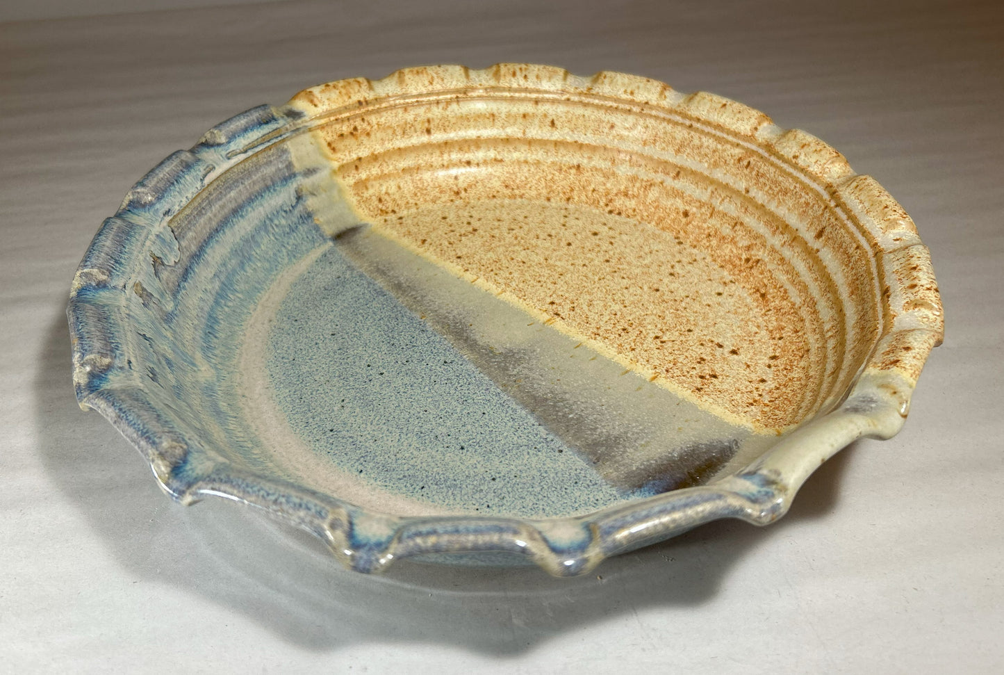 Stoneware Pie Plate Deep dish with fluted edge.