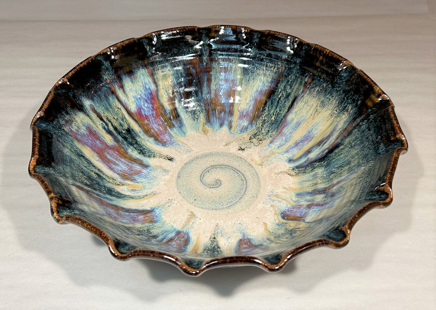 Beautiful Pottery serving bowl with fluted edge