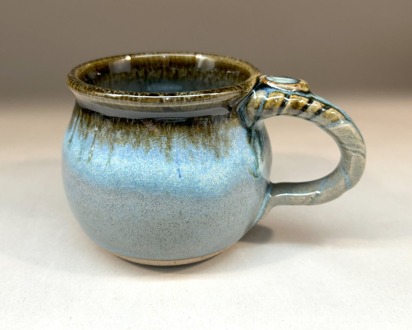 Handmade Pottery Mug with Ash Glaze – Rustic and Unique