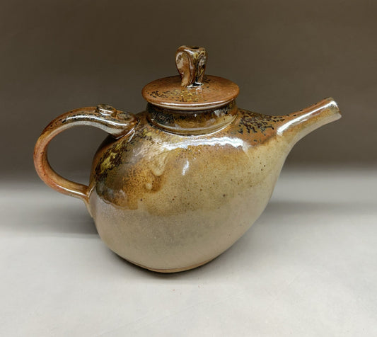 Handmade pottery teapot finished in a beautiful Shino glaze
