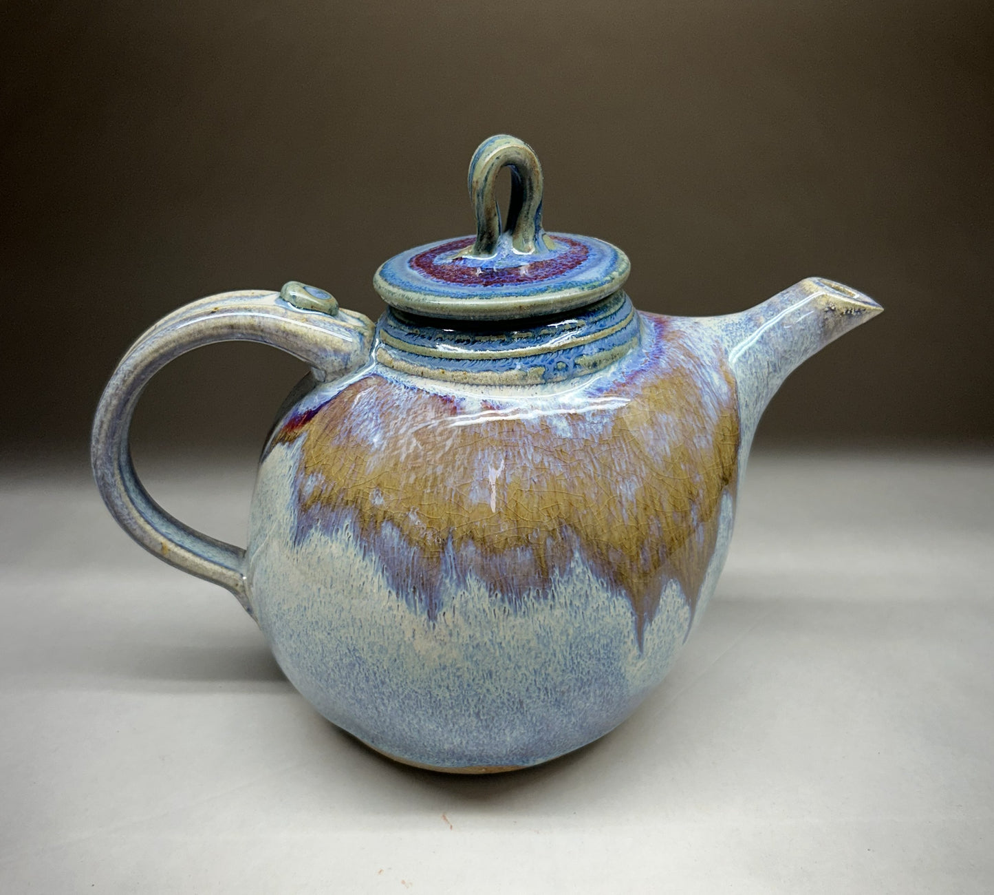 Handmade pottery teapot finished in a vibrant Electric Blue glaze