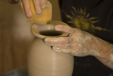 Throwing pottery vase at Canyon Creek Pottery.
