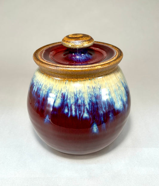 Lidded pottery jar