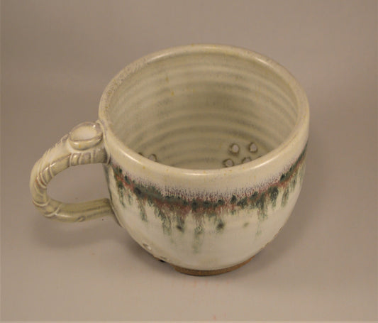 Pottery Berry colander with handle and Trout green glaze