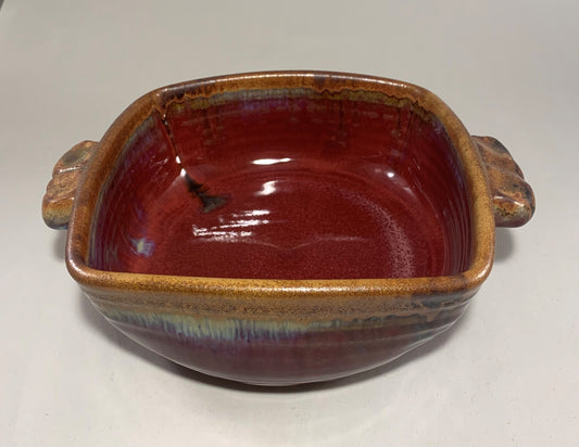 Handmade pottery Baking dish with handles and copper red glaze.